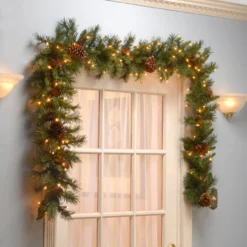 9' Pre-Lit Medium Pine Artificial Christmas Garland - Clear Lights -Noel Twinkle Shop dnat pc 9glo 1 4 92311.1667662719