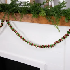 5' Green, Gold And Red Jingle Bell Christmas Garland, Unlit 13 5' Green, Gold And Red Jingle Bell Christmas Garland, Unlit -Noel Twinkle Shop northlight ys28302 styled20on20fireplace 2 21314.1686600976