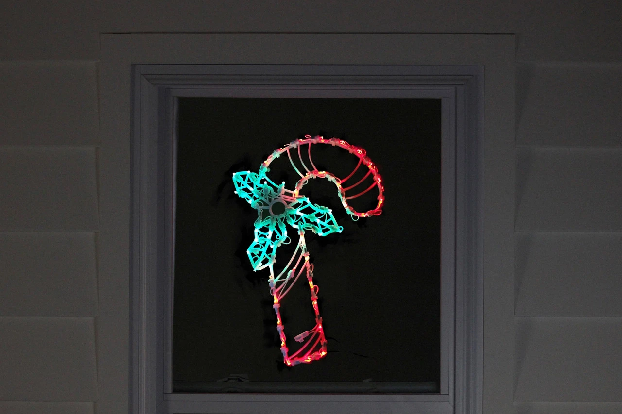 18" Red And Green LED Lighted Candy Cane Christmas Window Silhouette Decoration 5 18" Red And Green LED Lighted Candy Cane Christmas Window Silhouette Decoration - Image 3